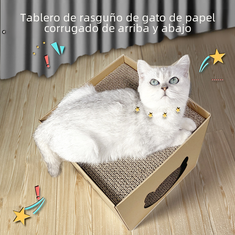 White cat sitting inside an open cardboard scratcher box